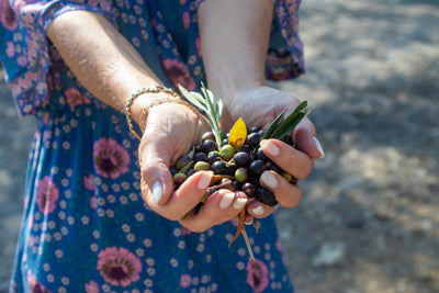 Giada holding olives