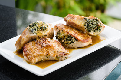 Pork Chops Stuffed with Sun-Dried Tomatoes and Spinach, Credit: Ray Kachatorian