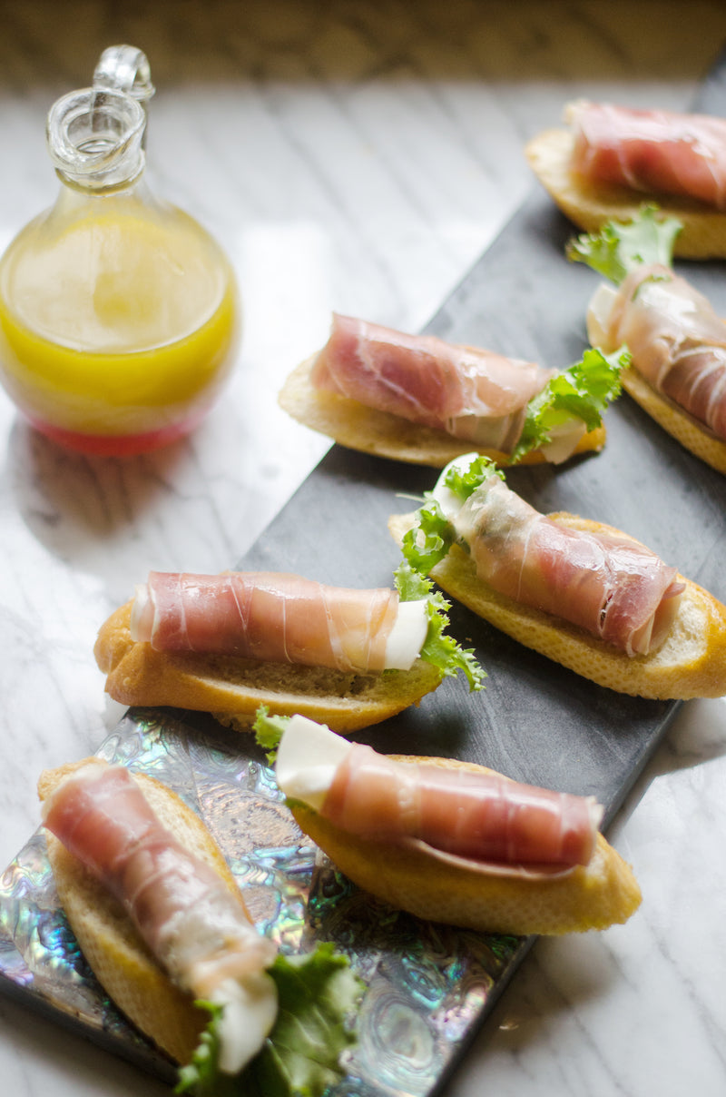 Curly Endive, Prosciutto and Mozzarella on Bruschetta, Credit: Elizabeth Newman