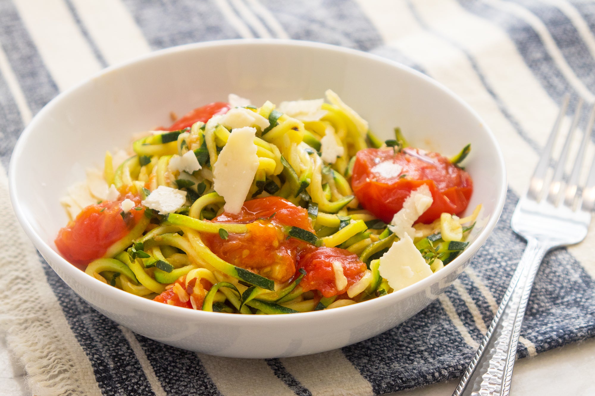 Zucchini Spaghetti with Sun Gold Tomato Sauce, Credit: Elizabeth Newman