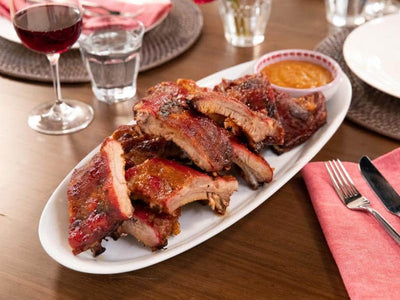 Baby Back Ribs with Spicy Peach BBQ Sauce, Credit: Food Network