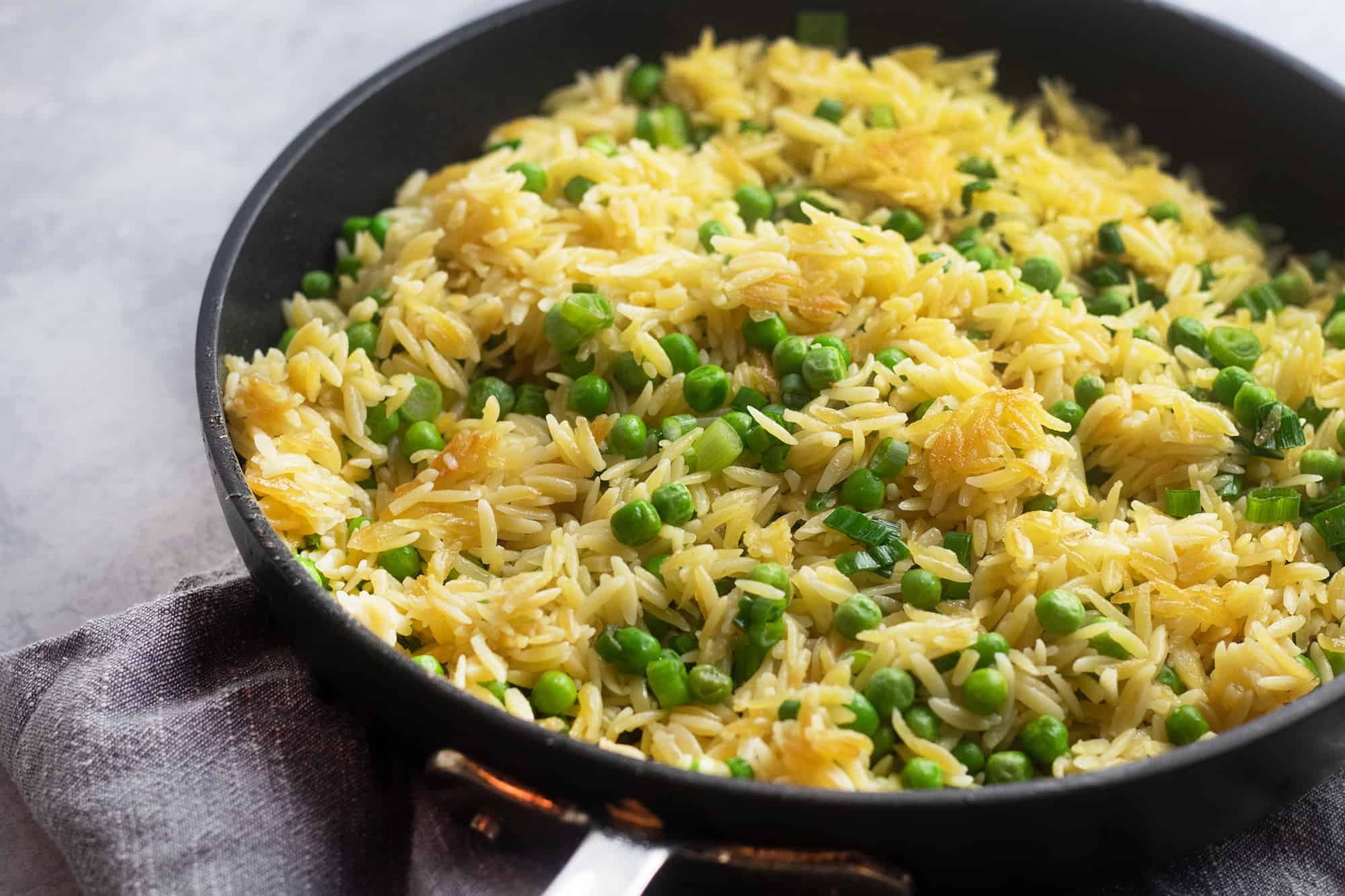 Crispy Coconut Orzo with Peas, Credit: Elizabeth Newman