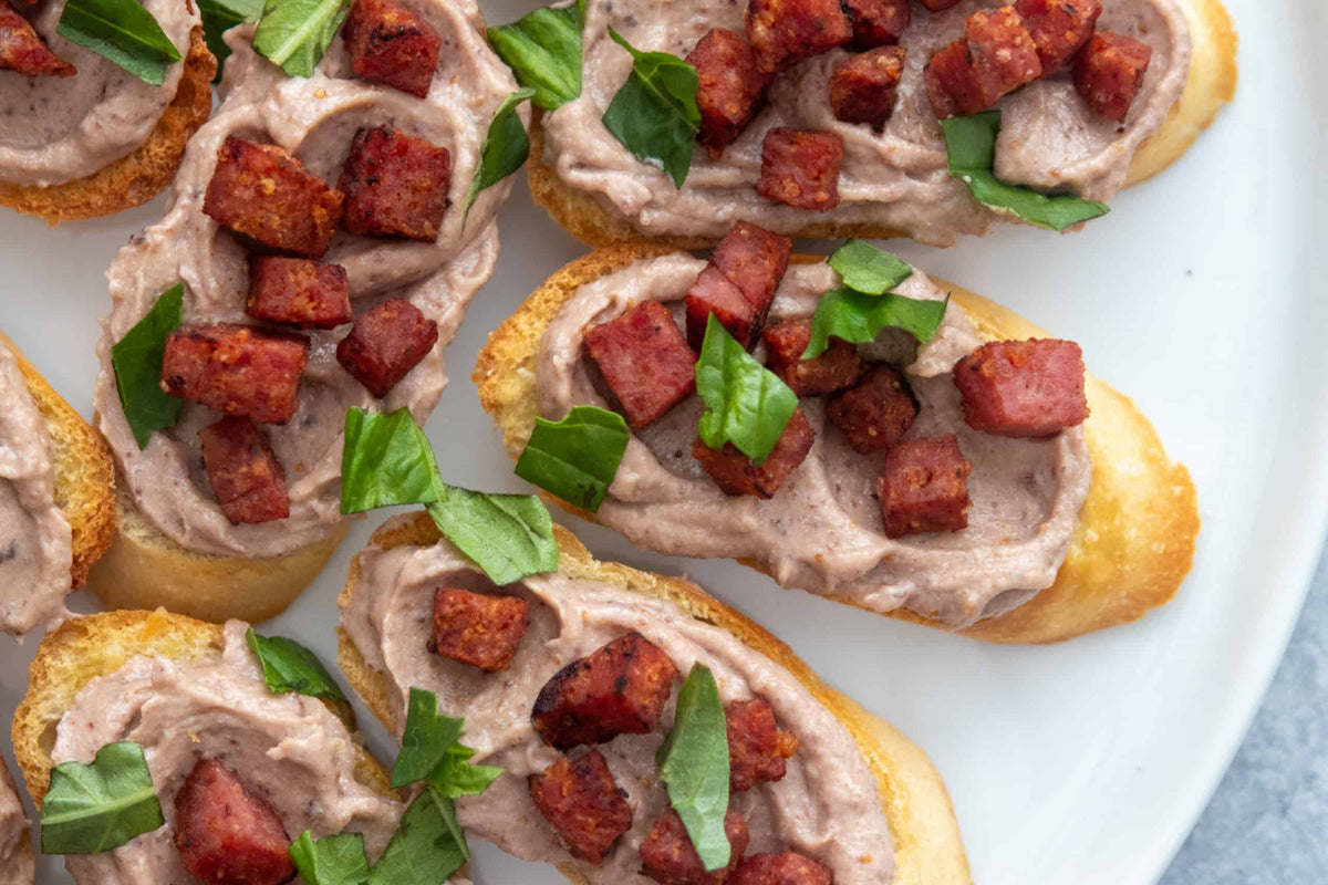 Crostini with Whipped Fig Ricotta and Crispy Salumi, Credit: Elizabeth Newman