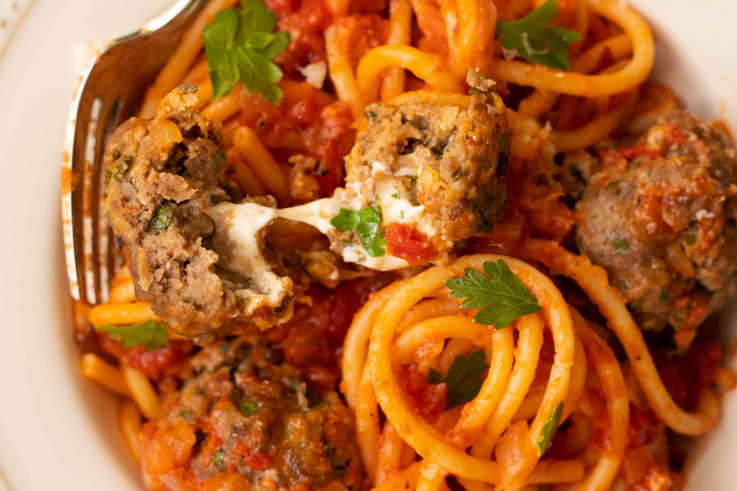 Bucatini All'Amatriciana with Smoked Mozzarella Meatballs, Credit: Elizabeth Newman