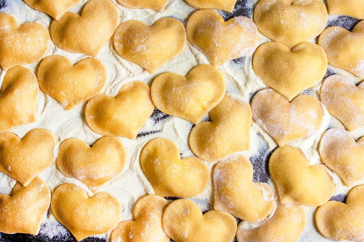 Heart-Shaped Cheese Ravioli In Pink Sauce, Credit: Elizabeth Newman