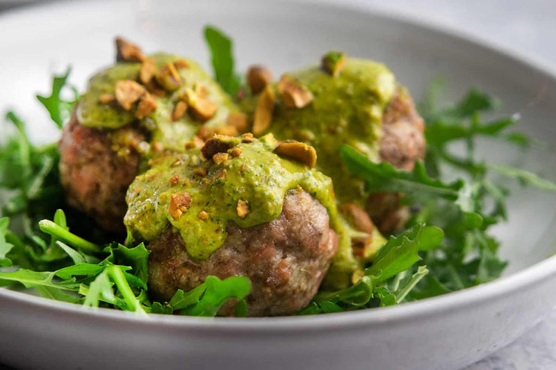 Mortadella Meatballs With Pistachio Pesto, Credit: Elizabeth Newman