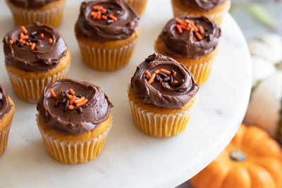 Mini Pumpkin Cupcakes with Chocolate Frosting, Credit: Elizabeth Newman