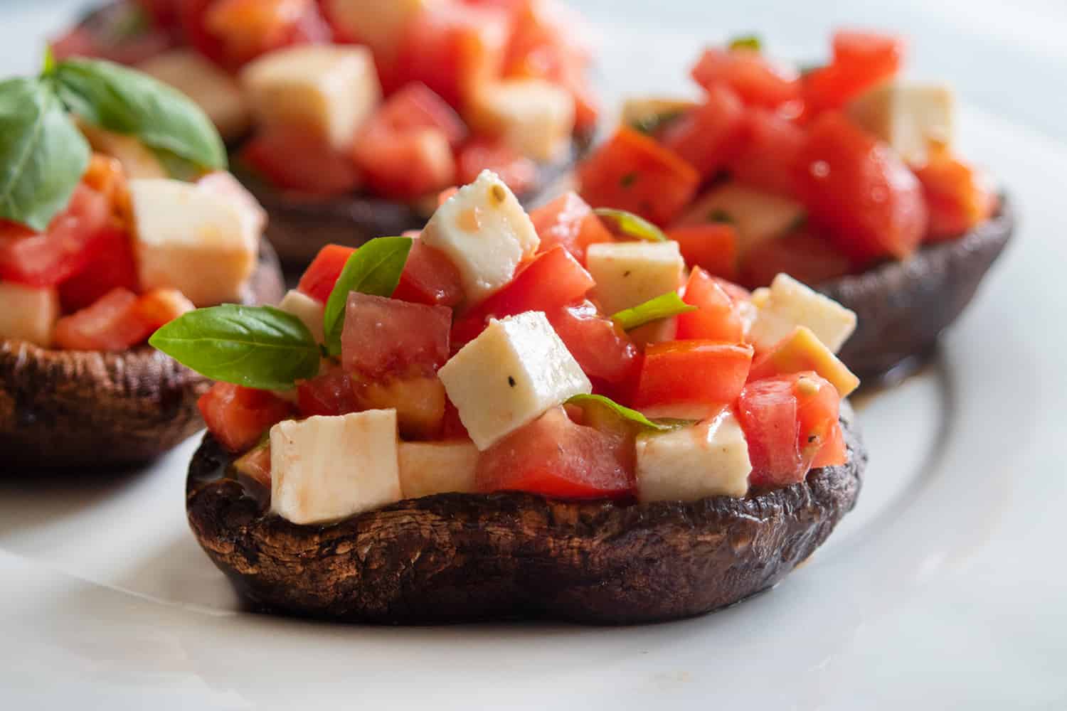 Grilled Portobellos With Tomatoes And Mozzarella, Credit: Elizabeth Newman