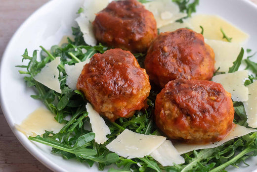 Giada's Pork Meatballs Over Arugula, Credit: Elizabeth Newman