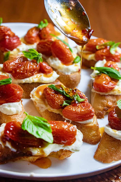 Ricotta Bruschetta with Sweet and Spicy Tomatoes, Credit: Food Network