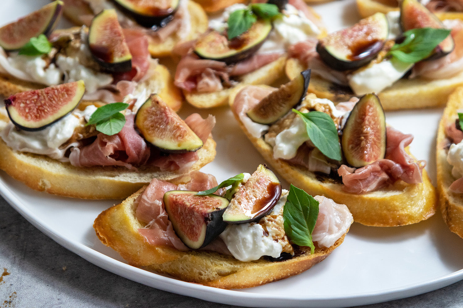 Burrata Prosciutto Fig Crostini