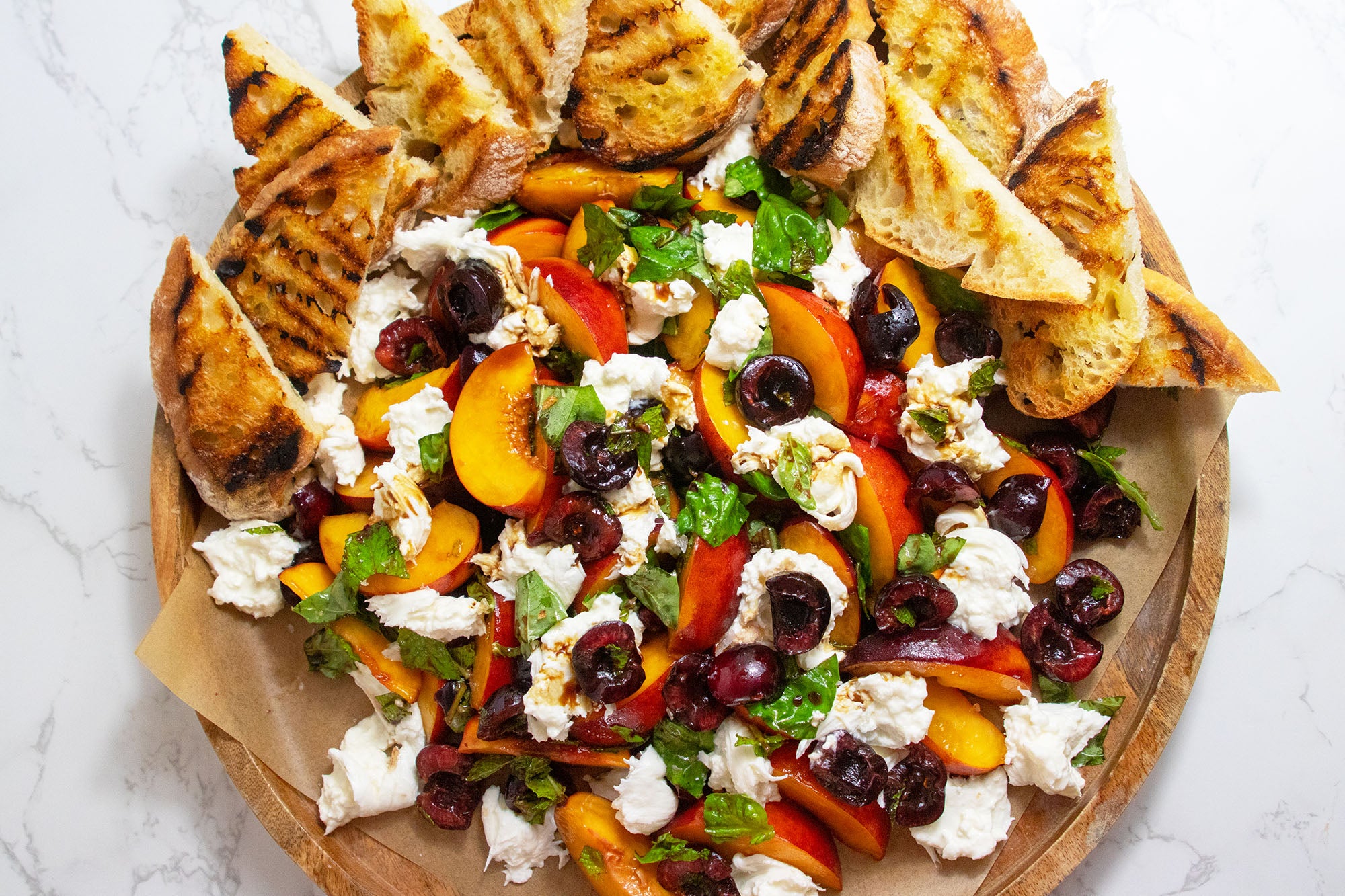 peach burrata cherry salad, image credit: Lizzy Newman