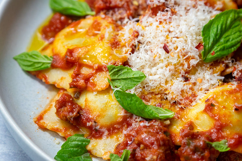 Sicilian Ricotta Ravioli with Sausage Ragu