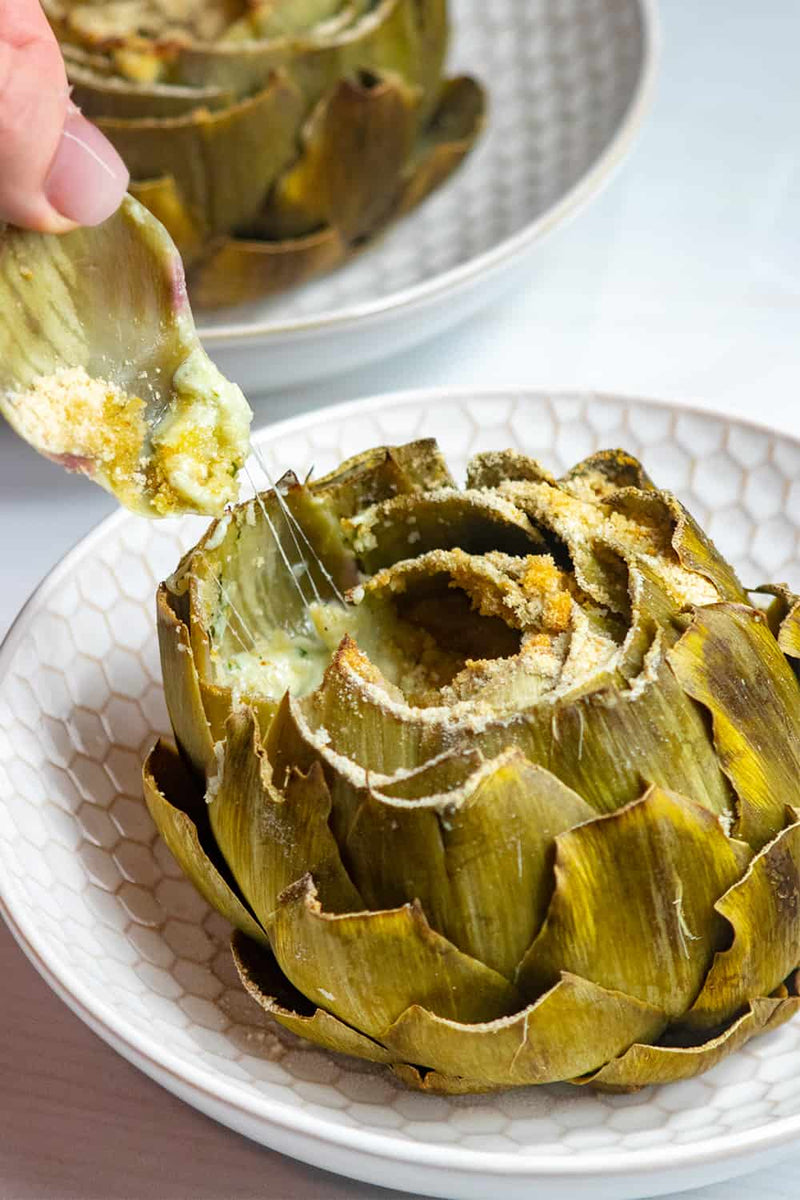 Cheesy Baked Artichokes, Credit: Elizabeth Newman